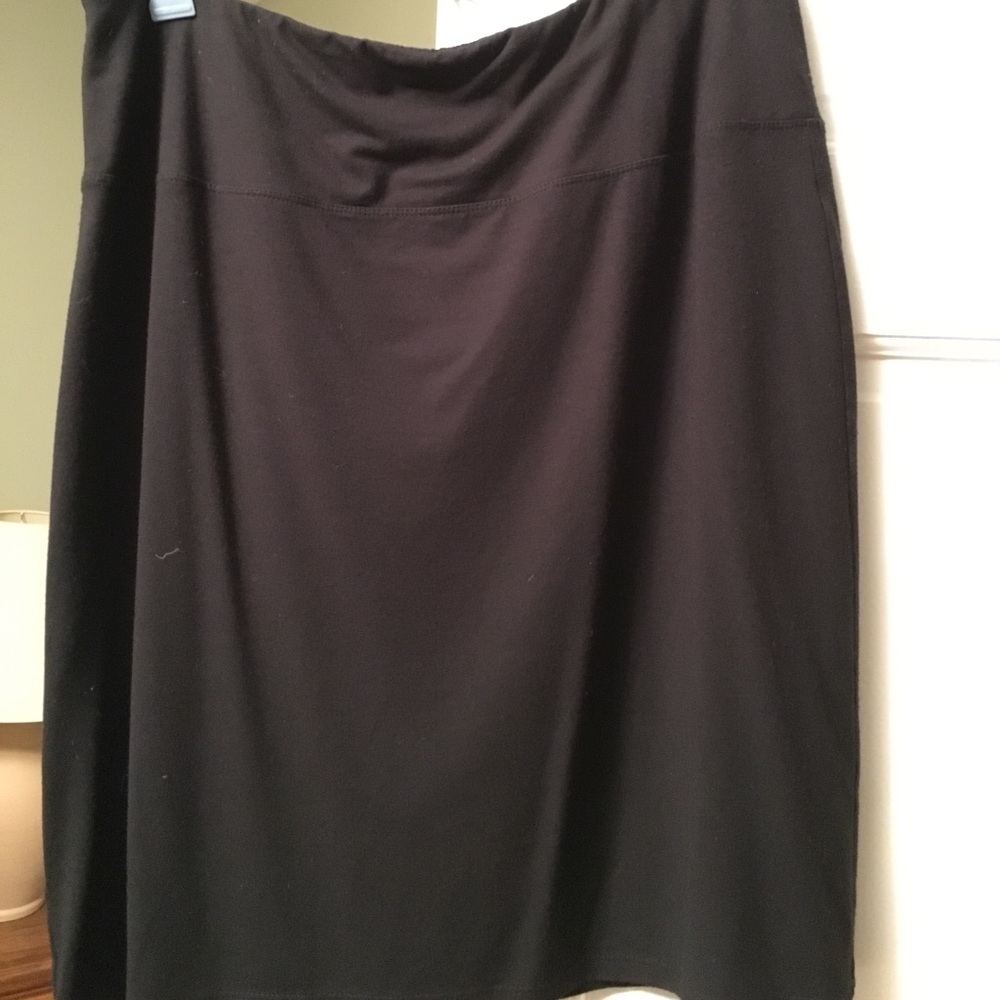 Black Rayon/Lycra skirt.
